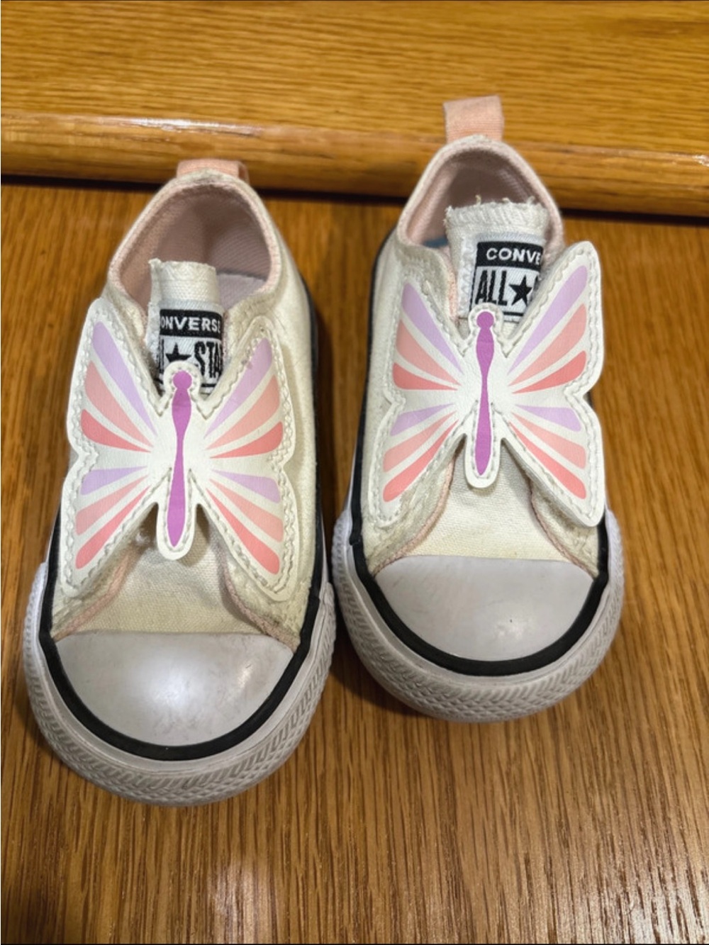 Converse Kids Slip-On Sneakers with Pink Butterfly Accents - Cream